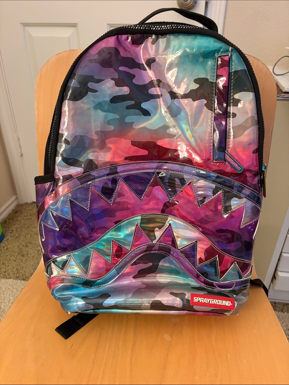 Sprayground Holographic Teal Purple Pink Camo Shark Backpack.